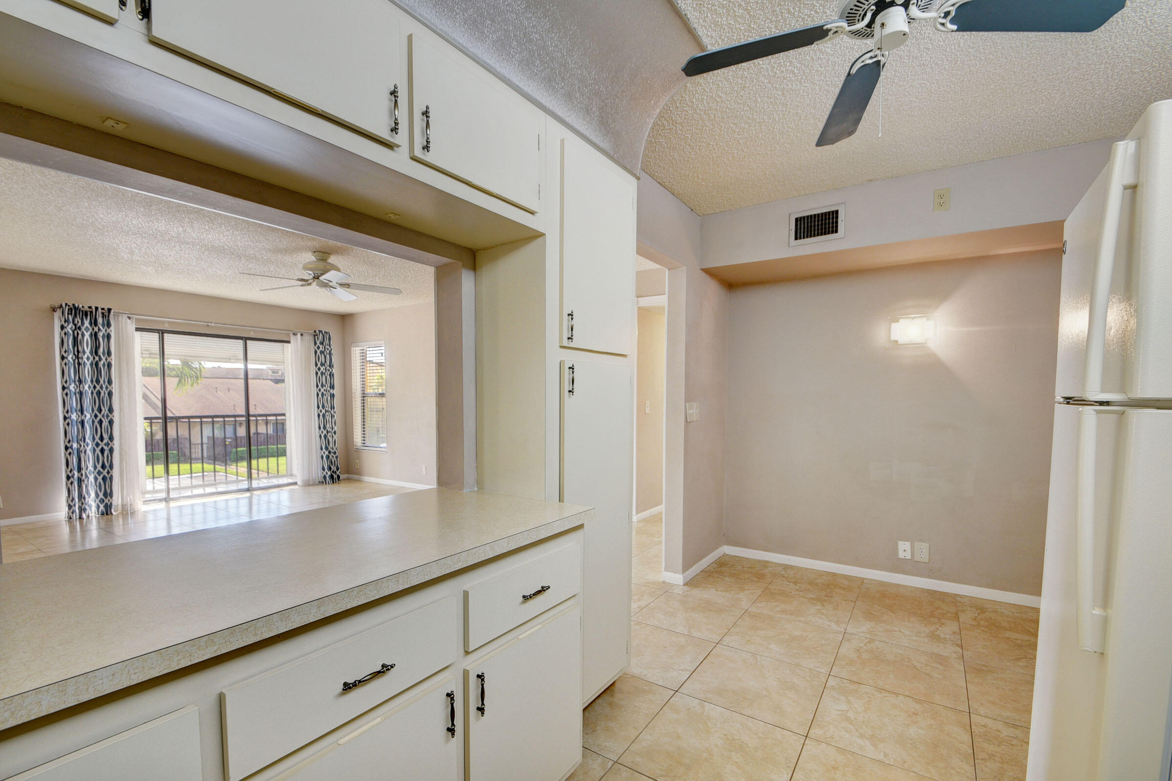 802 Sky Pine Way, Unit C2 Greenacres, FL 33415 - Photo 13 of 28 eat in kitchen