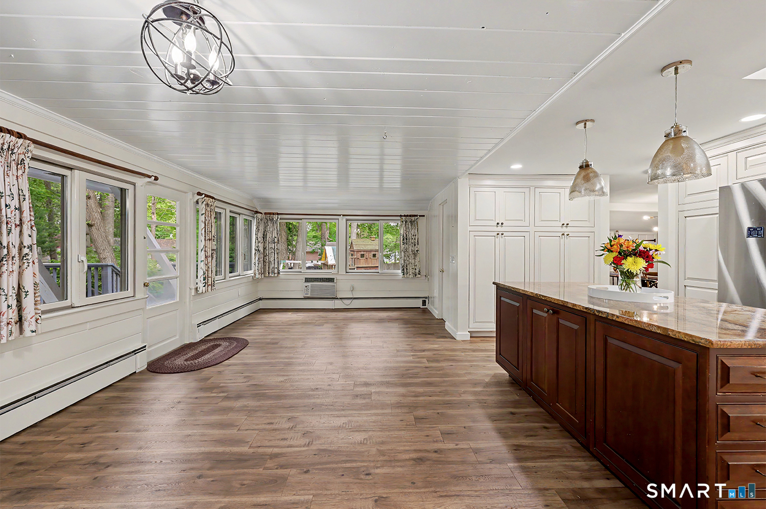 19 Geneva Road Norwalk, CT 06850 - Photo 14 of 33 a very nice looking room with wooden floor and windows