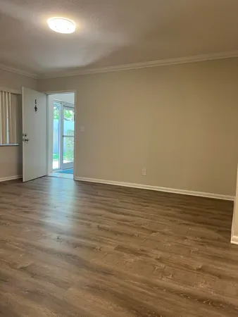 a view of an empty room and window