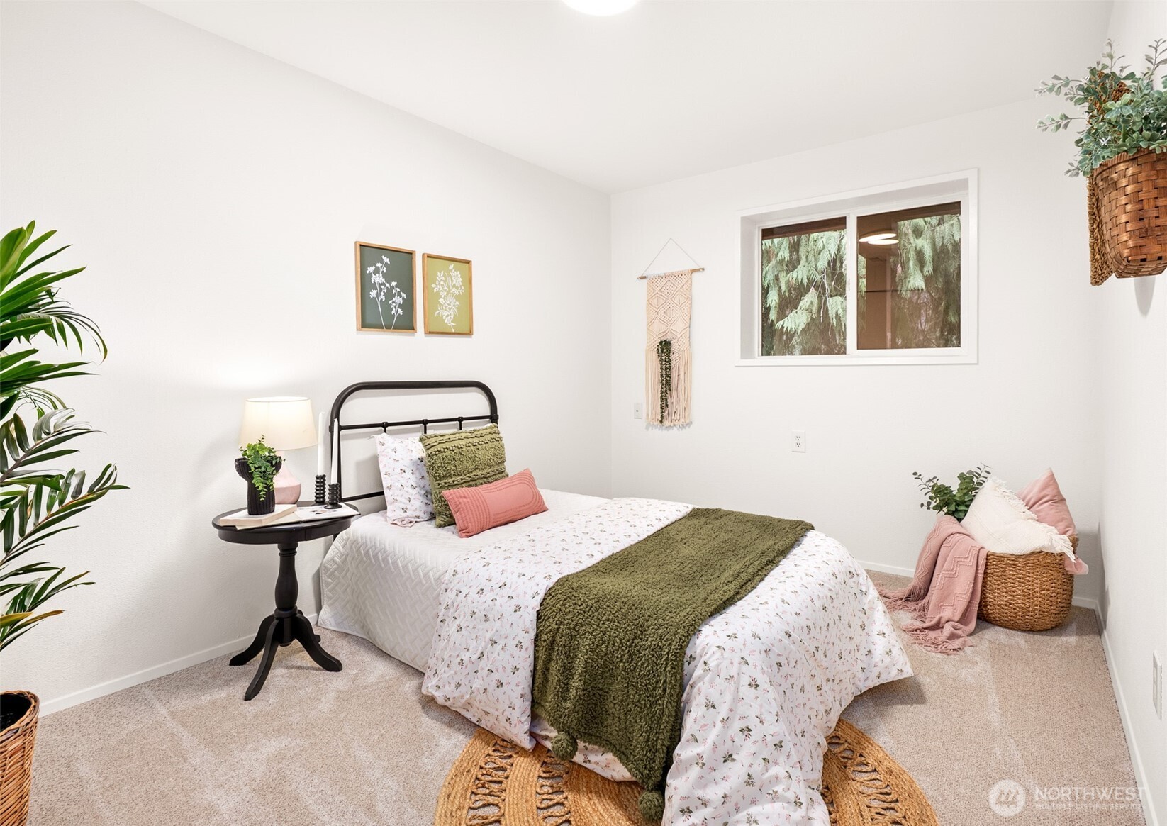 15727 Cascadian Way Bothell, WA 98012 - Photo 16 of 40 a bedroom with a bed and a potted plant