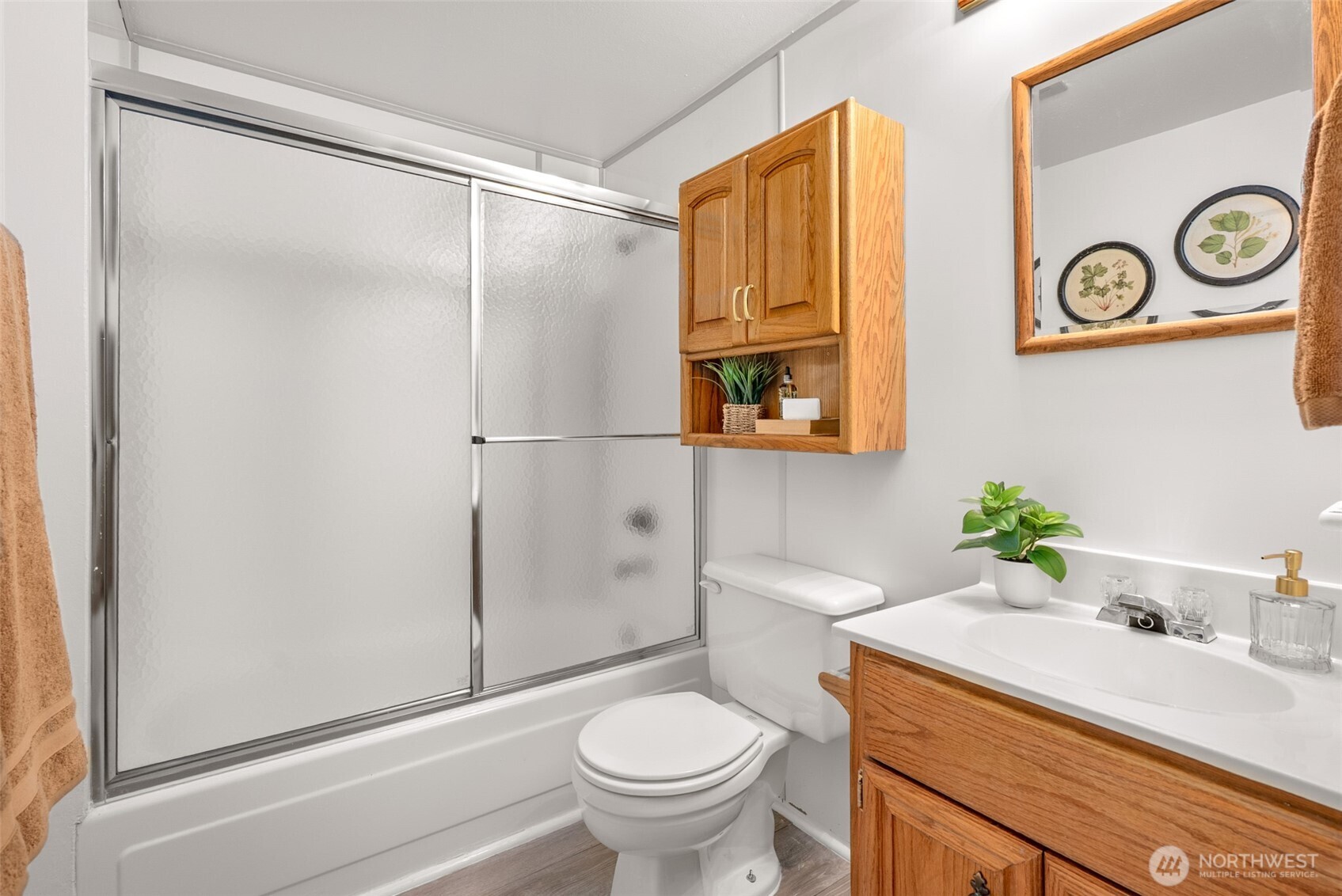 15727 Cascadian Way Bothell, WA 98012 - Photo 18 of 40 a bathroom with a granite countertop sink toilet and a shower
