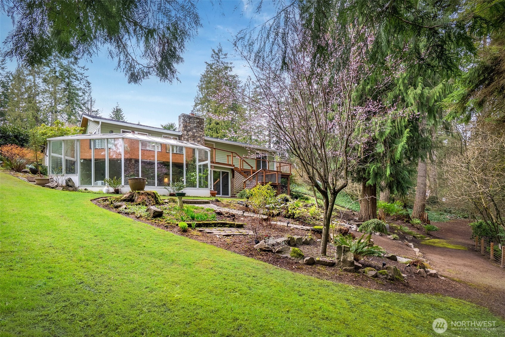 15727 Cascadian Way Bothell, WA 98012 - Photo 25 of 40 a view of a house with backyard porch and sitting area