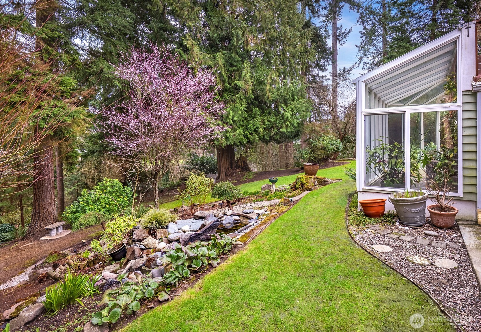 15727 Cascadian Way Bothell, WA 98012 - Photo 27 of 40 a view of a backyard with garden