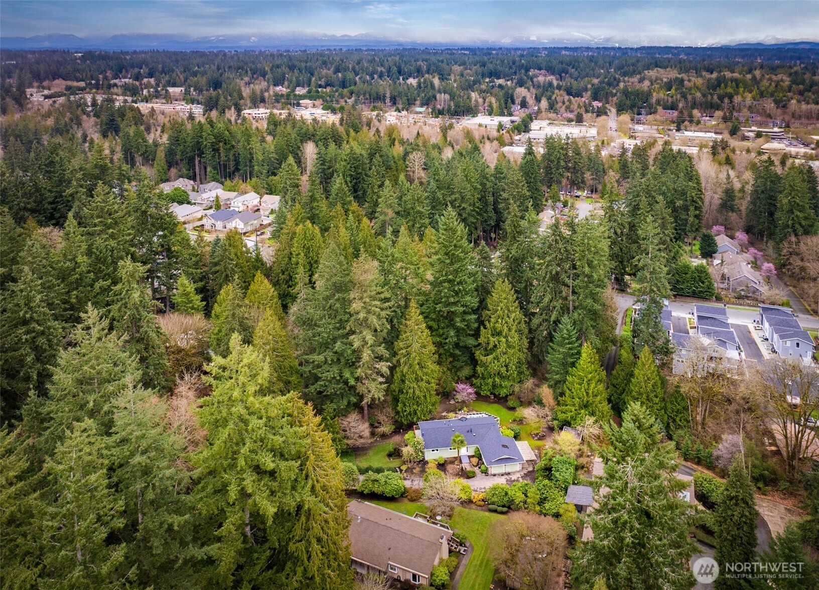 15727 Cascadian Way Bothell, WA 98012 - Photo 32 of 40 an aerial view of a houses with a yard and lake view