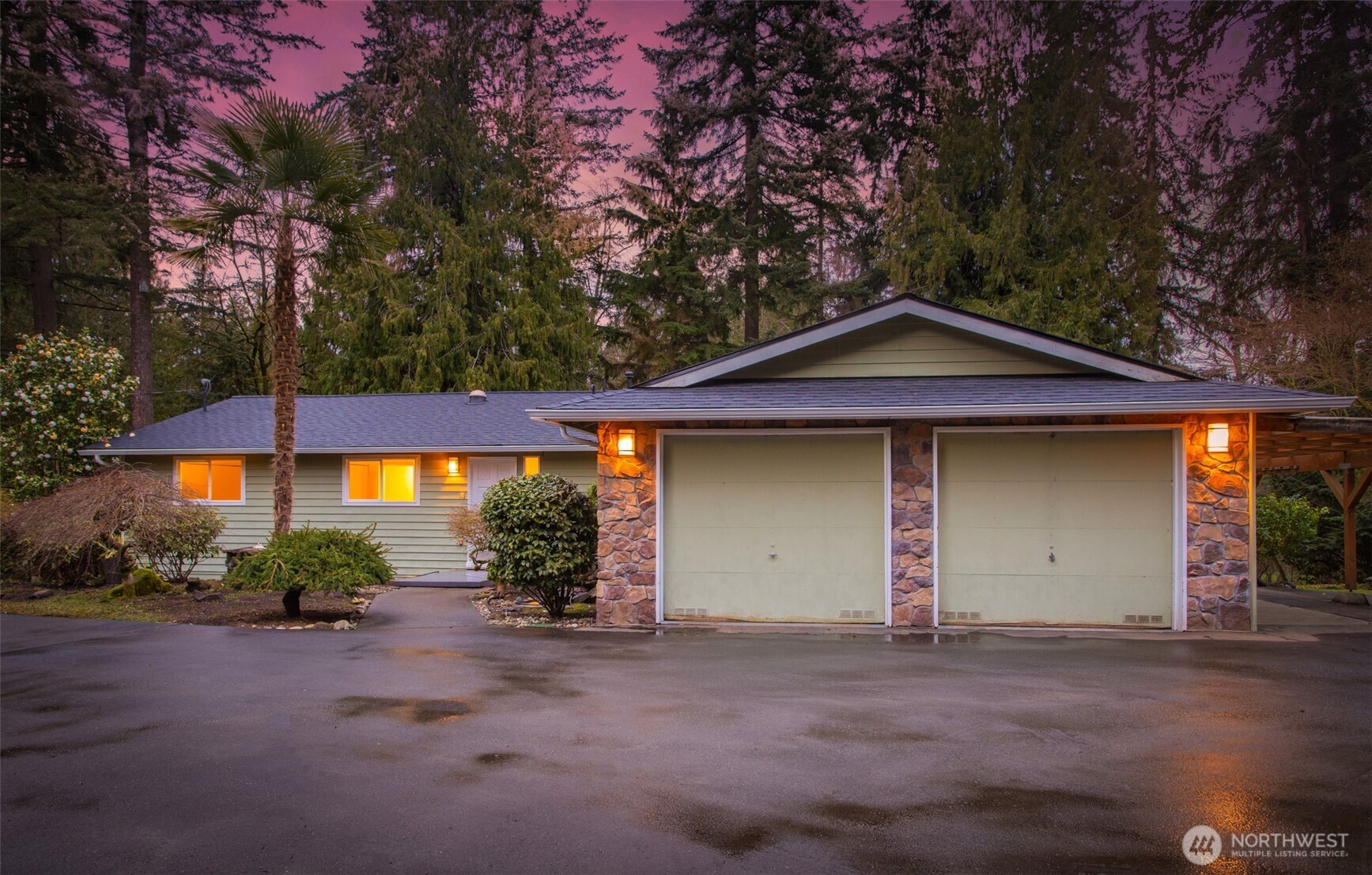 15727 Cascadian Way Bothell, WA 98012 - Photo 40 of 40 a front view of a house with a yard and garage
