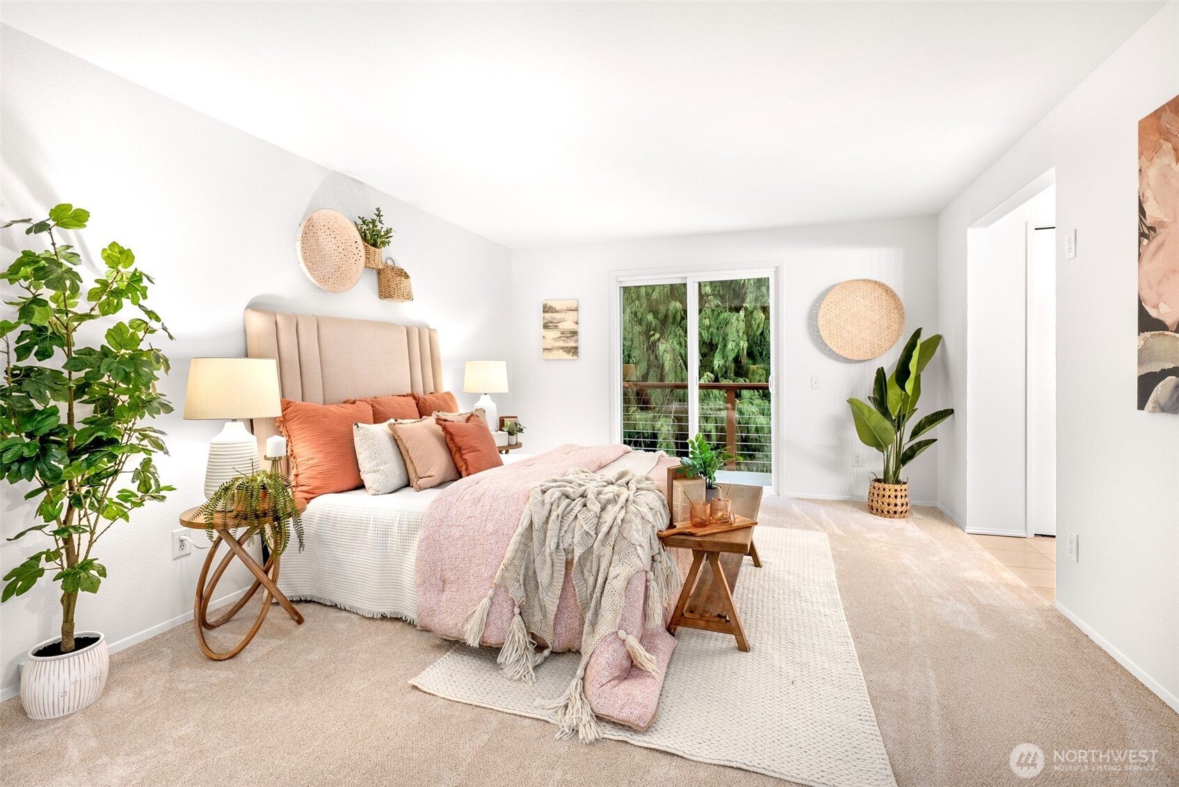 15727 Cascadian Way Bothell, WA 98012 - Photo 9 of 40 a bedroom with a bed and a potted plant