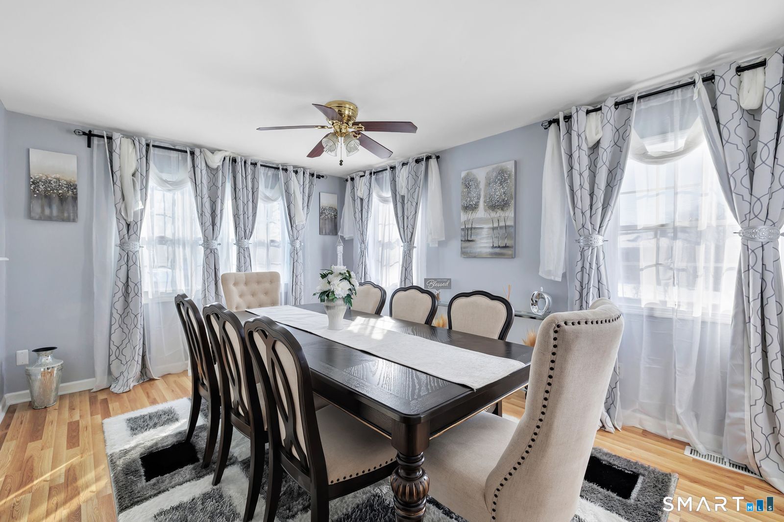 84 Eileen Road West Haven, CT 06516 - Photo 16 of 37 a view of a a dining room with furniture window and wooden floor