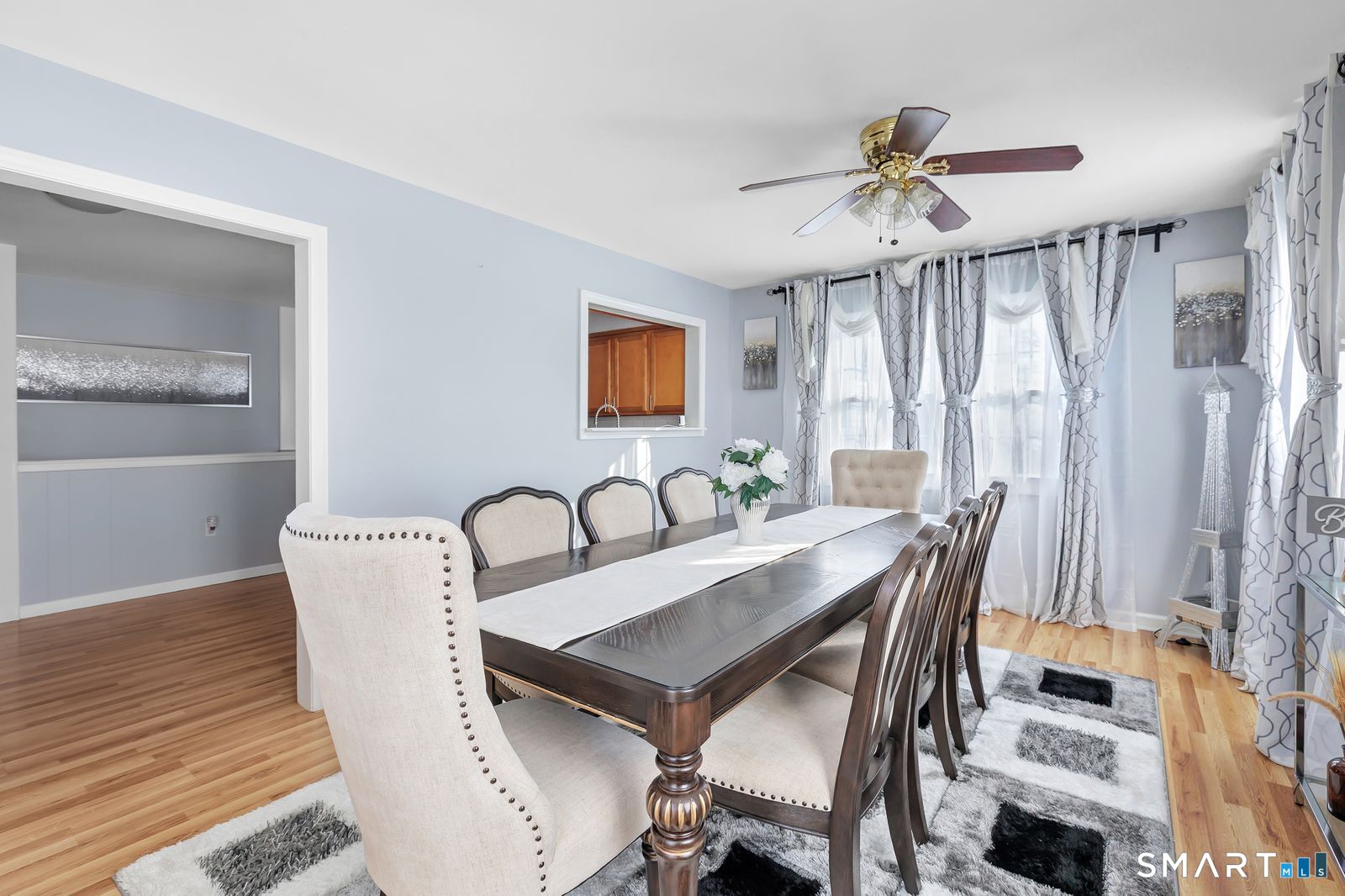84 Eileen Road West Haven, CT 06516 - Photo 17 of 37 a view of a dining room with furniture and wooden floor