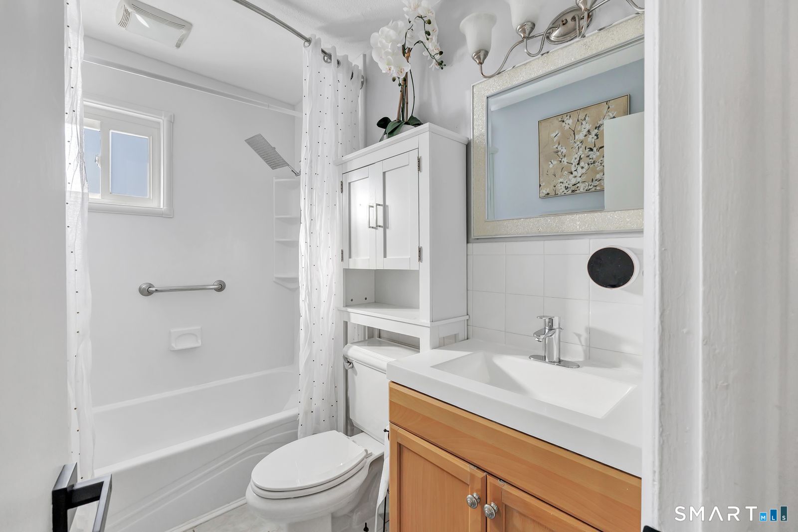 84 Eileen Road West Haven, CT 06516 - Photo 19 of 37 a bathroom with a granite countertop sink toilet and shower