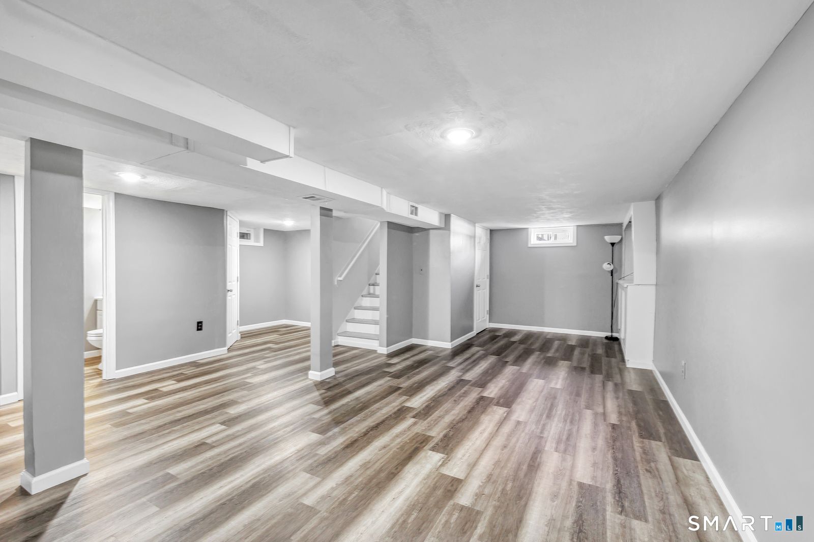 84 Eileen Road West Haven, CT 06516 - Photo 26 of 37 a view of a room with a wooden floor