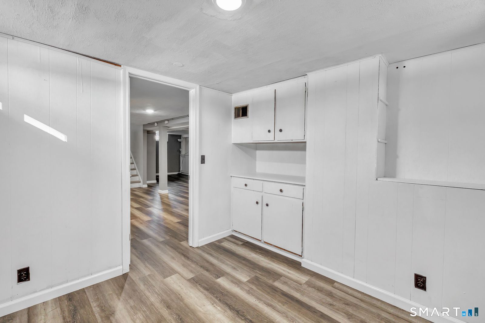 84 Eileen Road West Haven, CT 06516 - Photo 31 of 37 a view of a kitchen with wooden floor