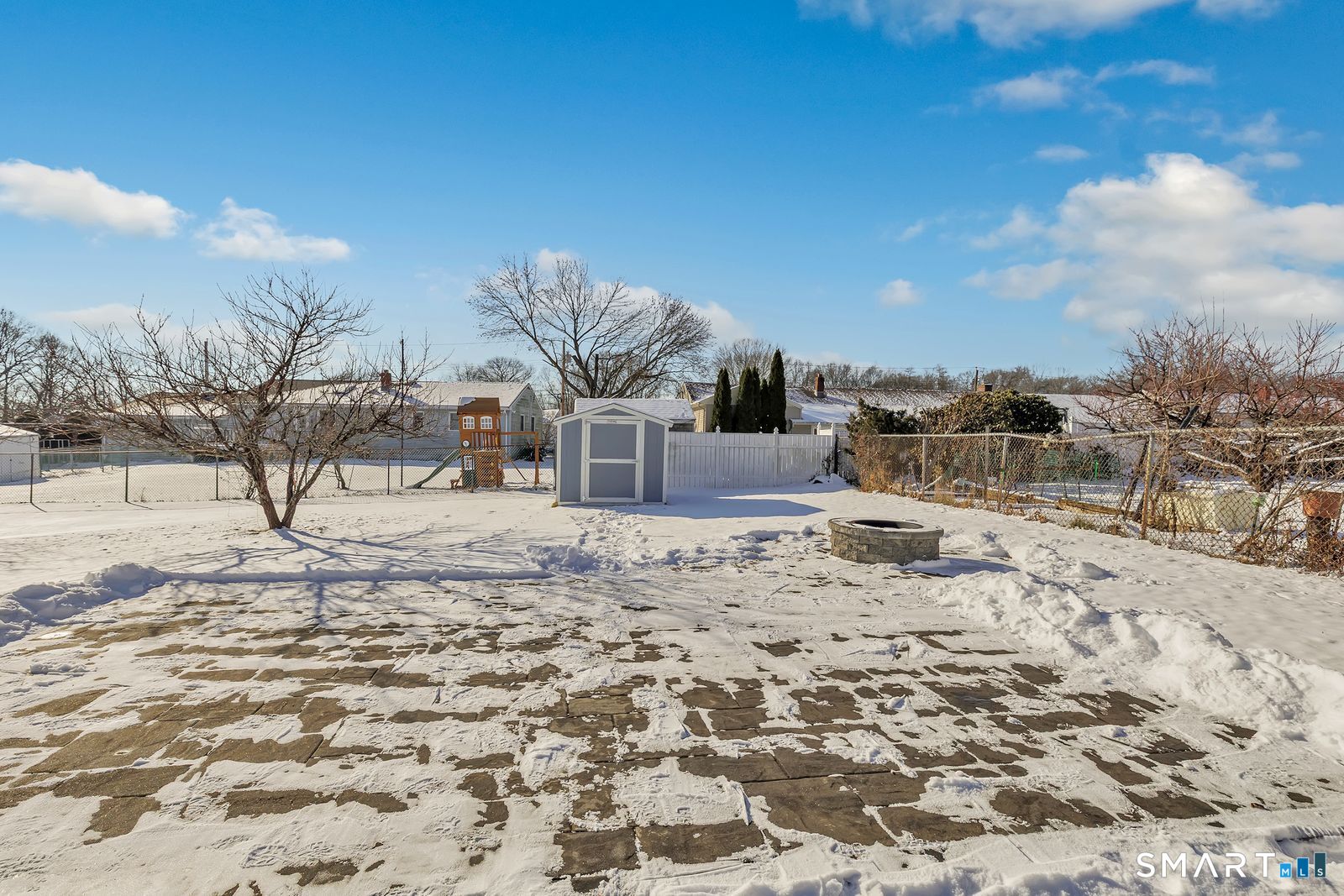 84 Eileen Road West Haven, CT 06516 - Photo 34 of 37 a view of a backyard of snow