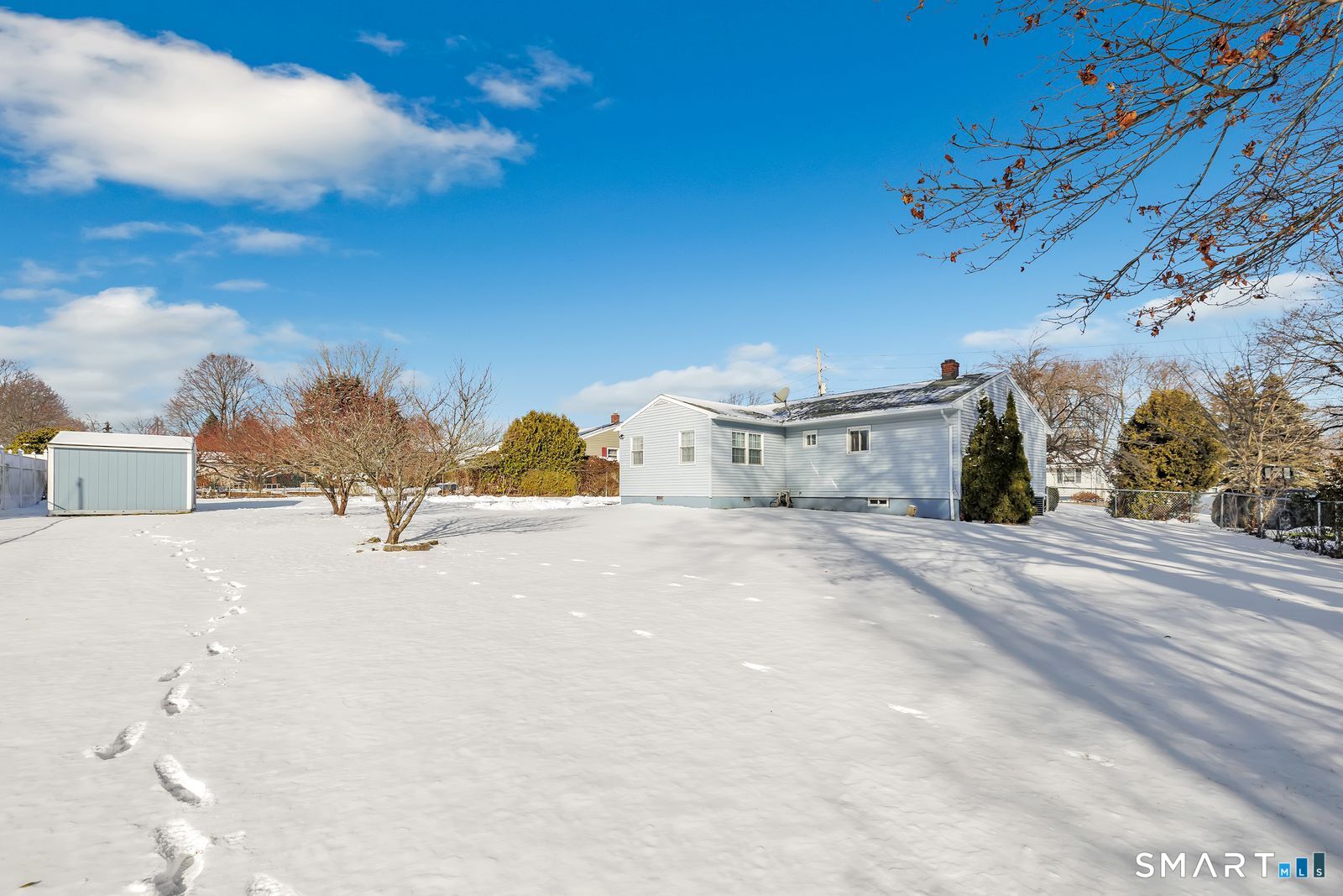 84 Eileen Road West Haven, CT 06516 - Photo 35 of 37 a view of a house with a yard