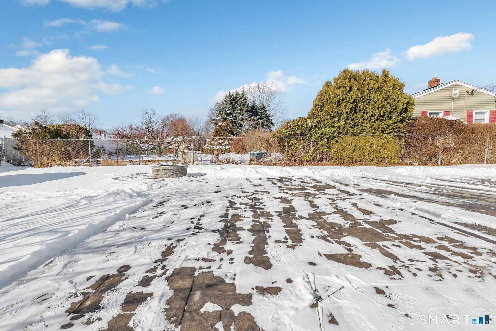 84 Eileen Road West Haven, CT 06516 - Photo 37 of 37 a view of a yard with snow on the road