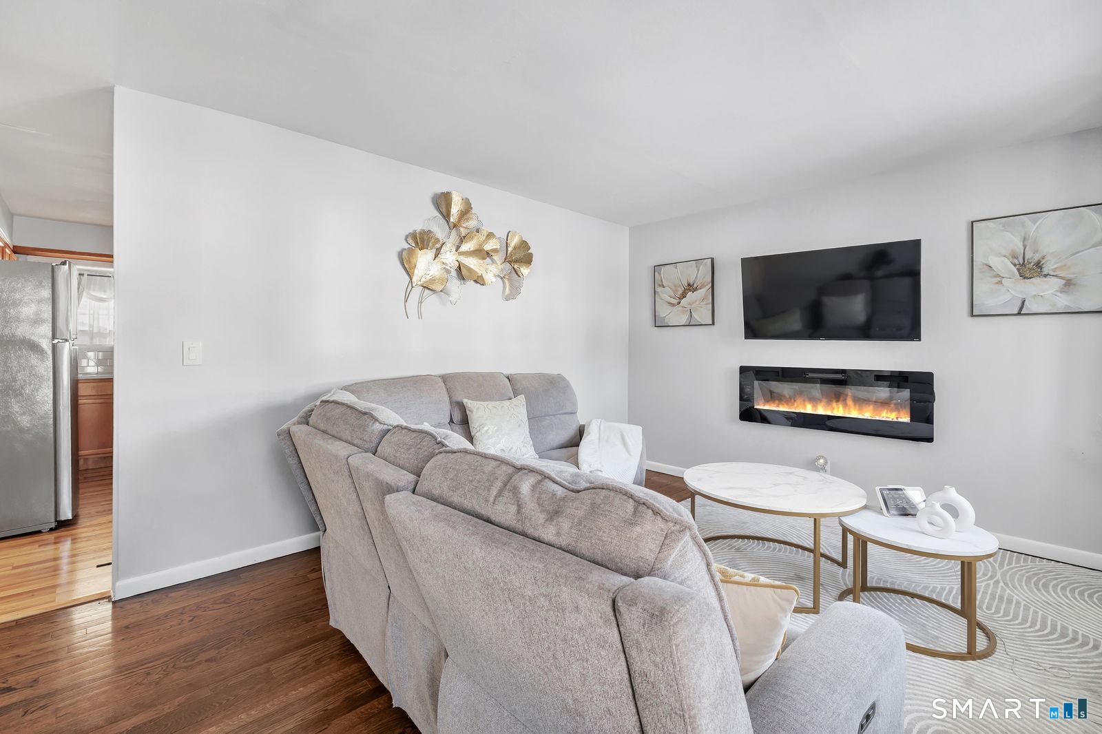 84 Eileen Road West Haven, CT 06516 - Photo 7 of 37 a living room with furniture and a flat screen tv