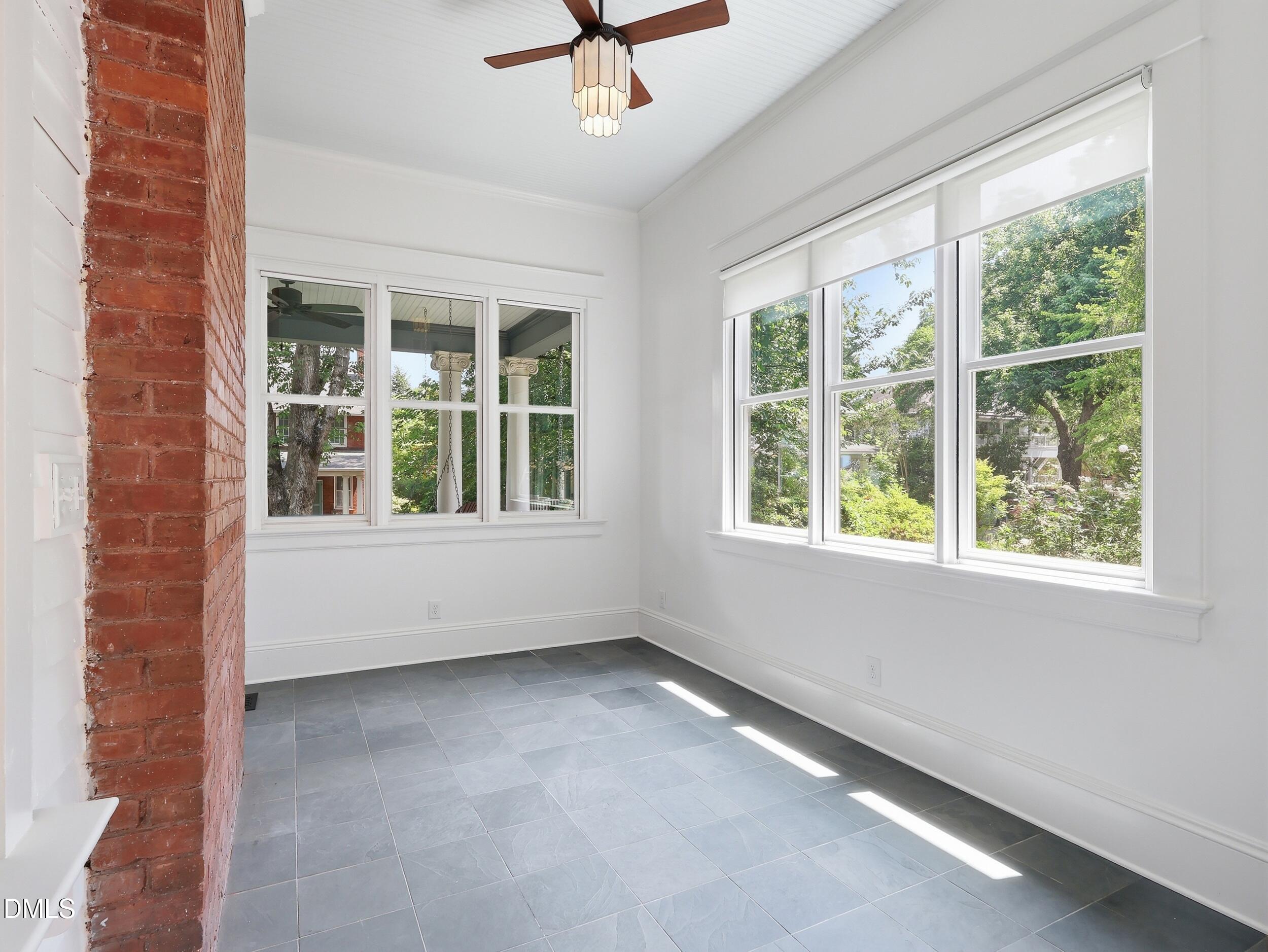 127 Forest Road Raleigh, NC 27605 - Photo 19 of 75 a view of an empty room with a window
