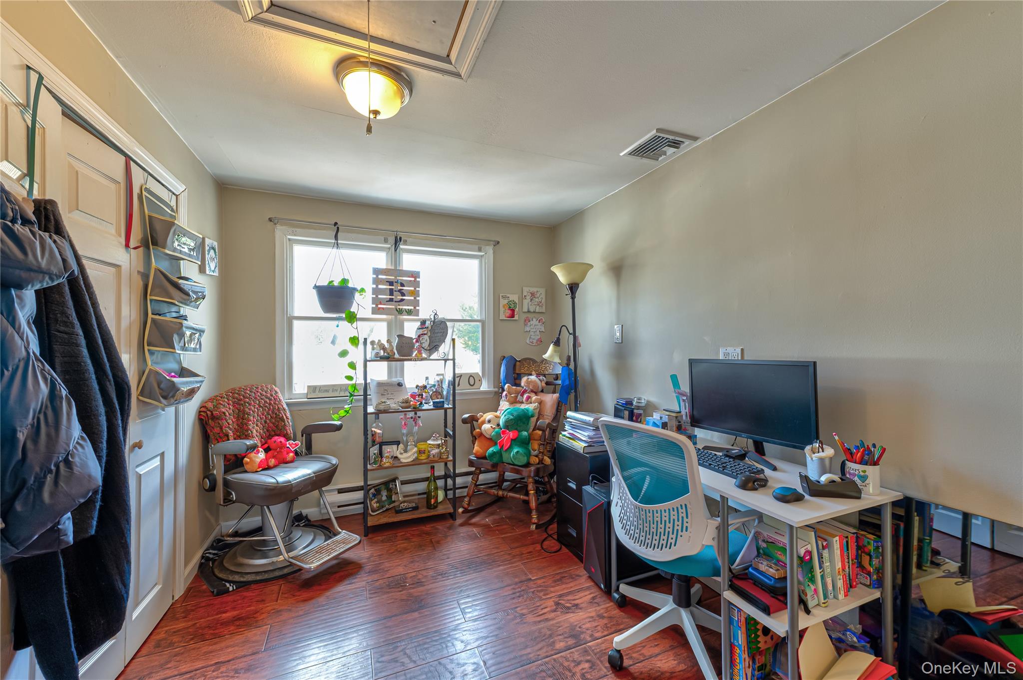 27 Half Mile Road Middle Island, NY 11953 - Photo 15 of 35 Bonus room can be office play area has double closets with pull down attic stairs