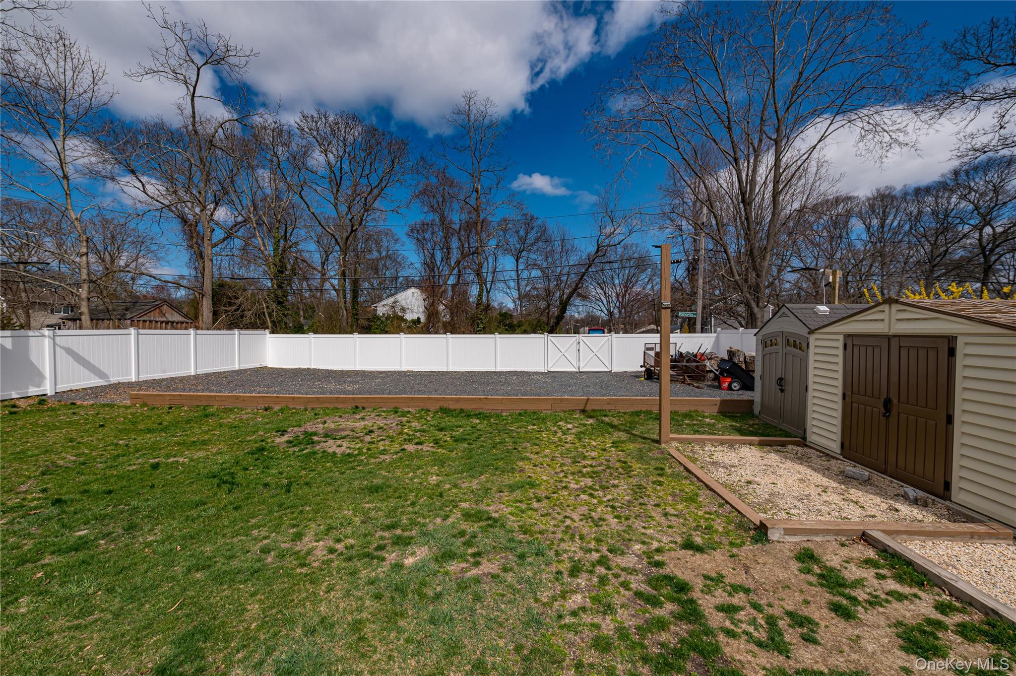 27 Half Mile Road Middle Island, NY 11953 - Photo 24 of 35 House goes from one block to next Extra parking in rear 2 sheds