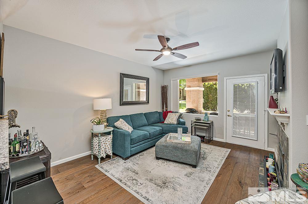 900 S, Unit 2312 Reno, NV 89521 - Photo 9 of 20 a living room with furniture and a window