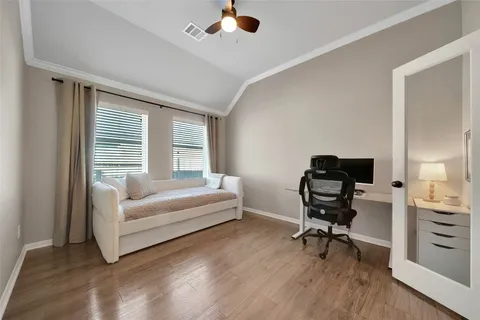 a kitchen with stainless steel appliances kitchen island granite countertop a dining table chairs and sink