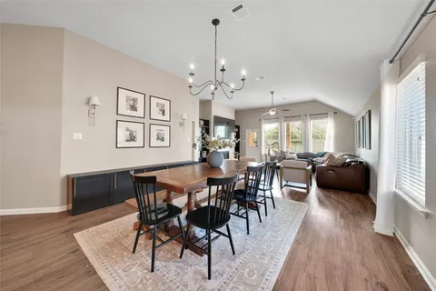 a living room with furniture fireplace and flat screen tv