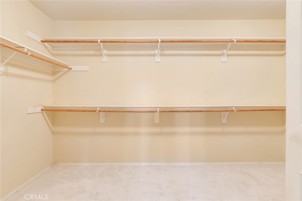 2967 Mangular Avenue Corona, CA 92882 - Photo 28 of 36 Primary Suite Walkin Closet