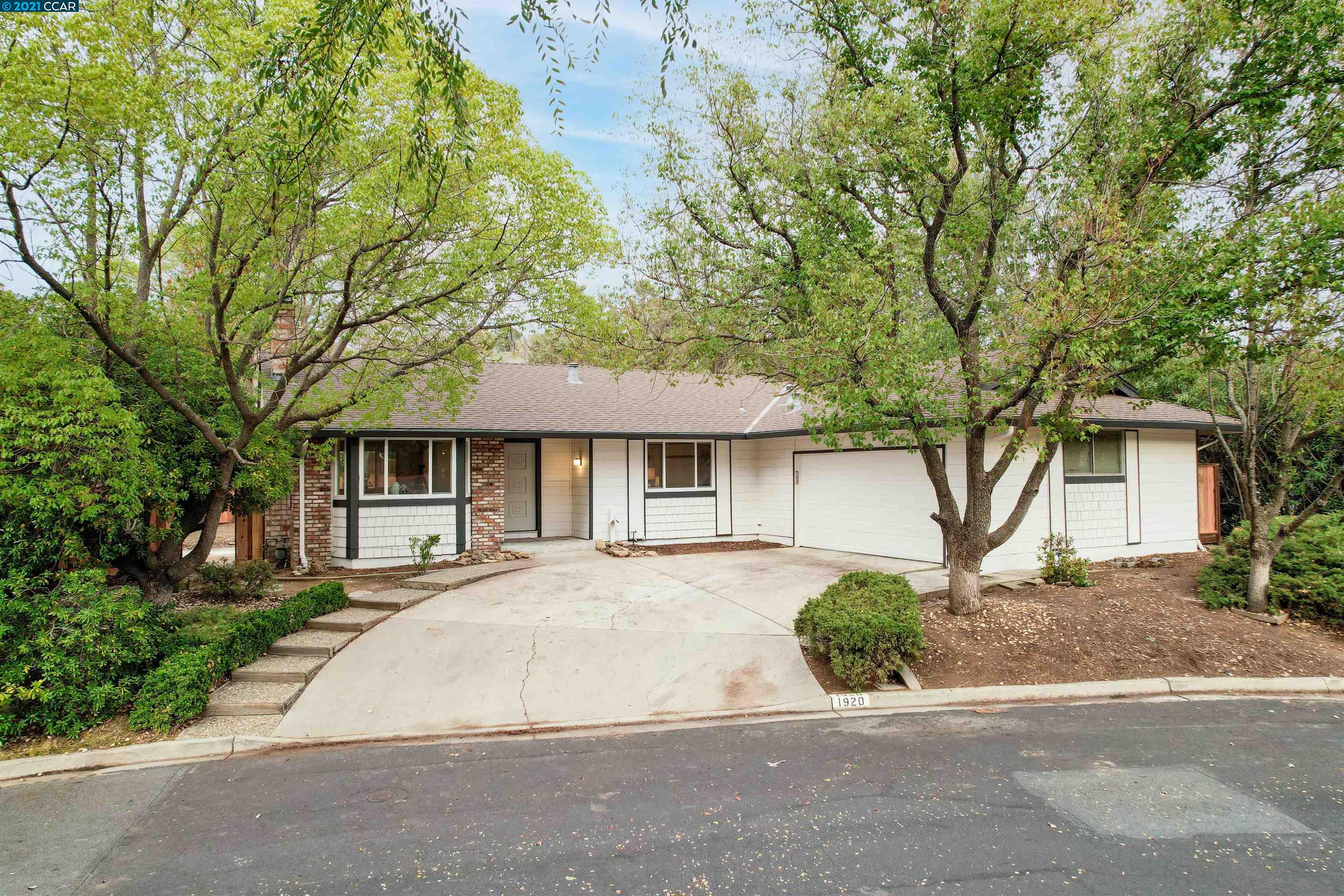 front view of a house with a street