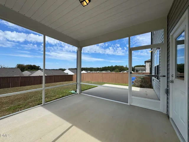 a view of a floor with wooden floor
