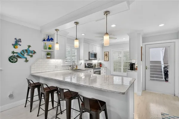 $309,900 | 1866 Southwest Palm City Road, Unit 107, Stuart, FL 34994