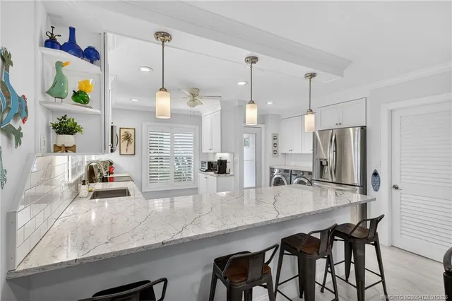 $344,900 | 1866 Southwest Palm City Road, Unit 107, Stuart, FL 34994