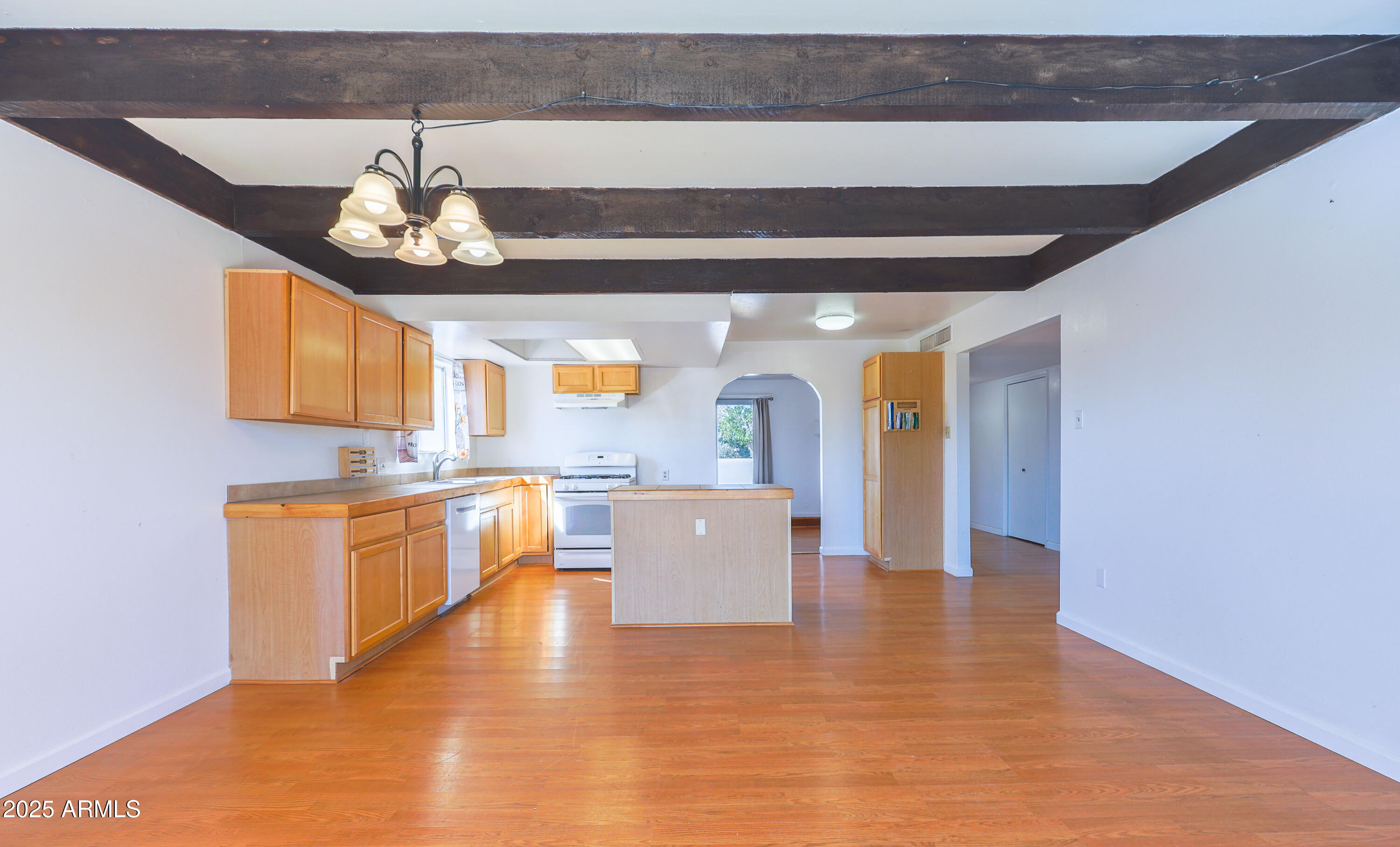106 Neff Place Pearce, AZ 85625 - Photo 12 of 28 a kitchen with stainless steel appliances granite countertop a sink and cabinets