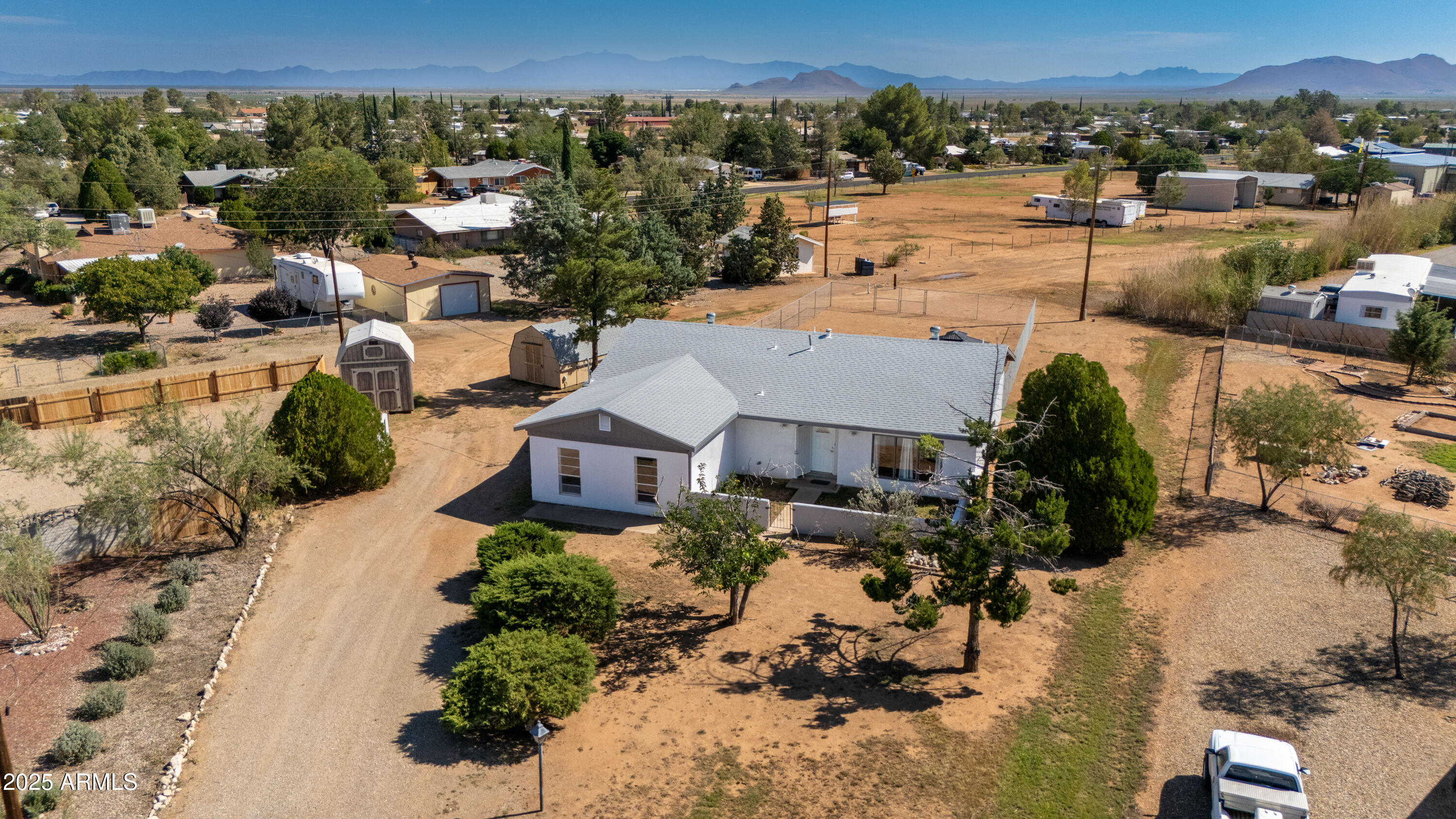106 Neff Place Pearce, AZ 85625 - Photo 3 of 28 an aerial view of a house with a yard lake view and mountain view