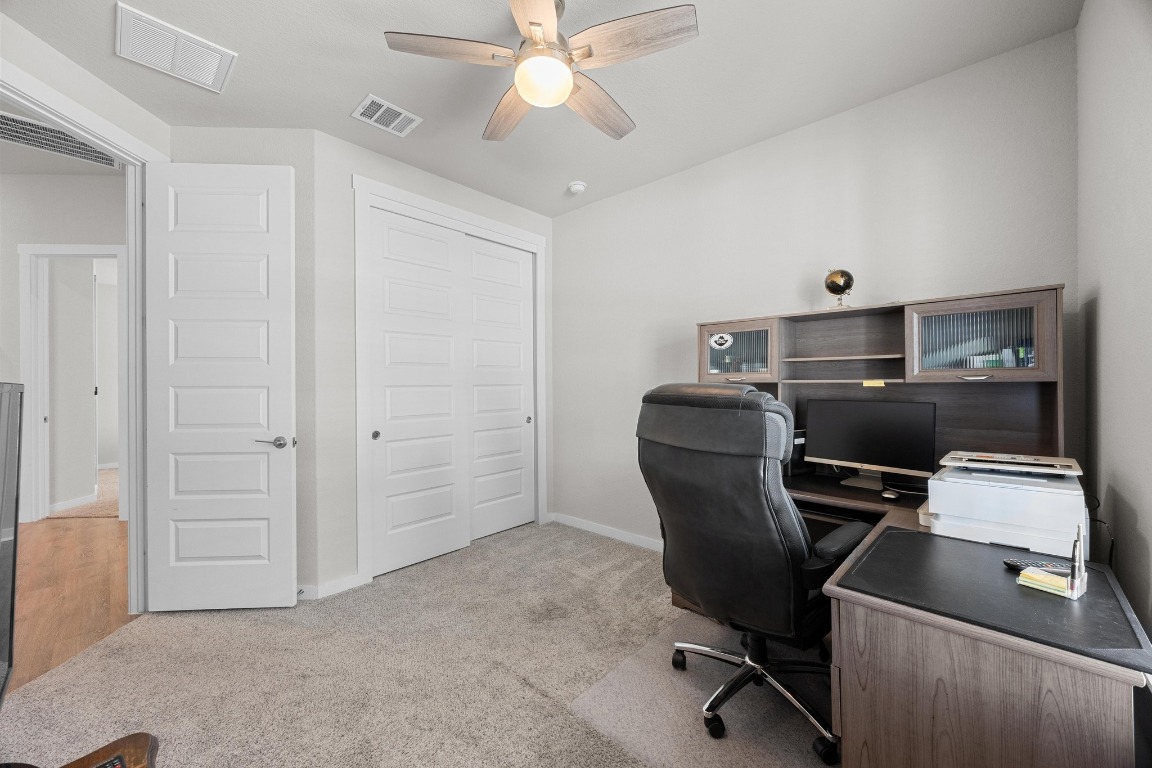 401 Peace Pipe Way Georgetown, TX 78628 - Photo 23 of 37 a view of a workspace with furniture