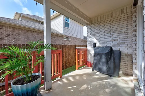 a kitchen with a stove and a refrigerator