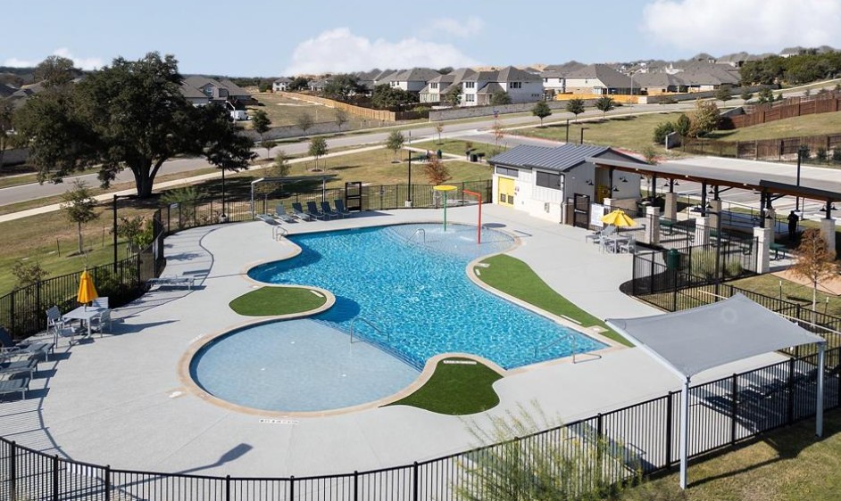 401 Peace Pipe Way Georgetown, TX 78628 - Photo 32 of 37 a view of a swimming pool with outdoor seating