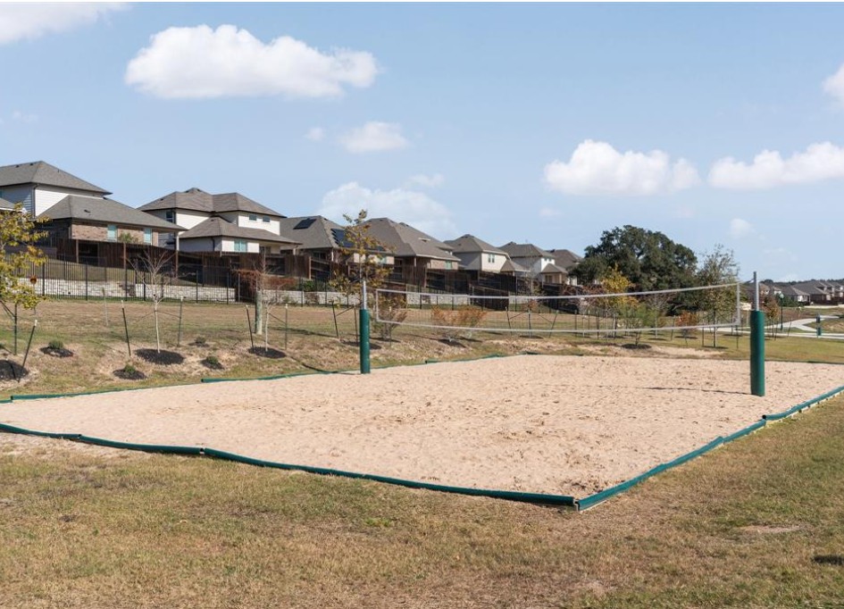 401 Peace Pipe Way Georgetown, TX 78628 - Photo 36 of 37 a view of a lake with a mountain