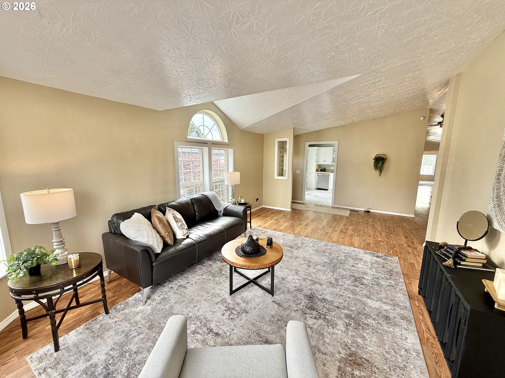 1282 3rd Street, Unit 37 Lafayette, OR 97127 - Photo 4 of 28 a living room with furniture and a large window