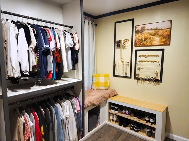 a bedroom with a bed and furniture