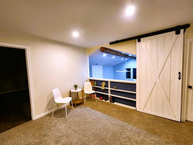 a view of a room with gym equipment