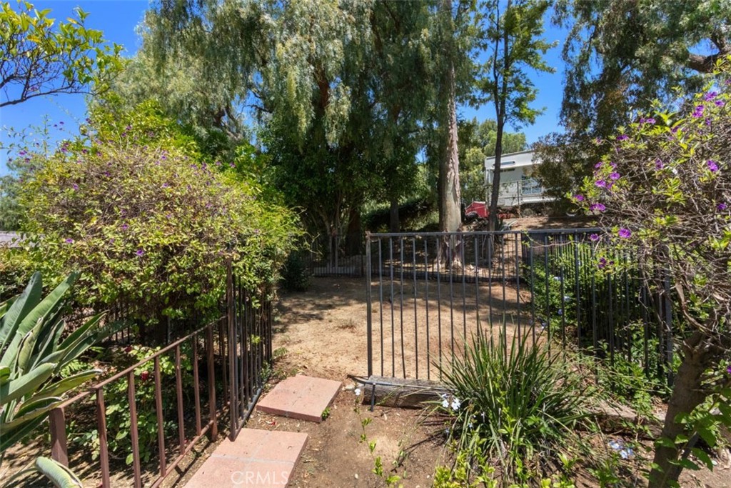 175 Wrangler Road Simi Valley, CA 93065 - Photo 24 of 52 a view of street along with trees