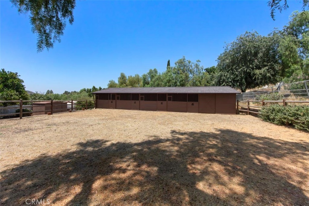 175 Wrangler Road Simi Valley, CA 93065 - Photo 26 of 52 a backyard of a house with lots of green space