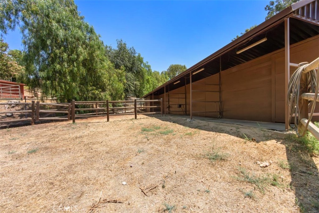 175 Wrangler Road Simi Valley, CA 93065 - Photo 28 of 52 a backyard of a house with a large tree