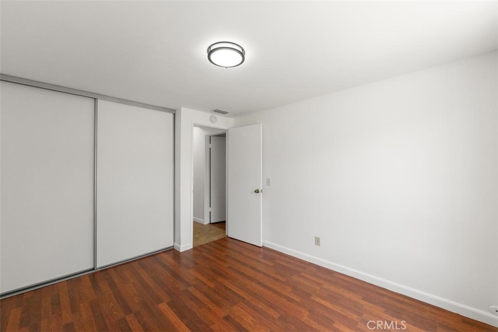 175 Wrangler Road Simi Valley, CA 93065 - Photo 44 of 52 a view of an empty room with wooden floor