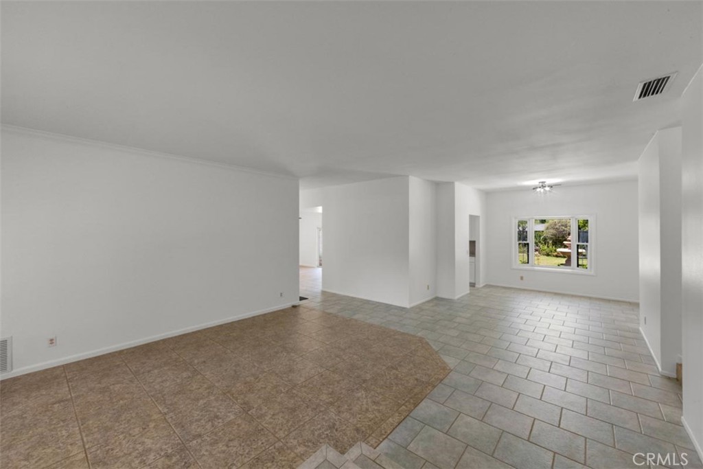 175 Wrangler Road Simi Valley, CA 93065 - Photo 8 of 52 a view of an empty room with painting on the wall