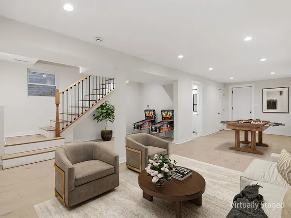 a living room with furniture and a table