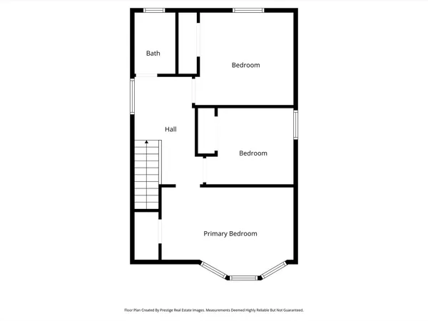 a picture of door with a white wall