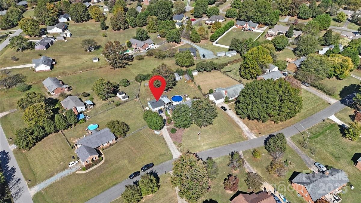 905 Stevens Road Monroe, NC 28110 - Photo 7 of 39 an aerial view of a house with a yard and fountain