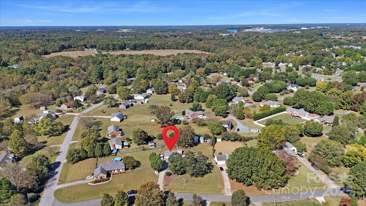 905 Stevens Road Monroe, NC 28110 - Photo 8 of 39 an aerial view of a city and mountain