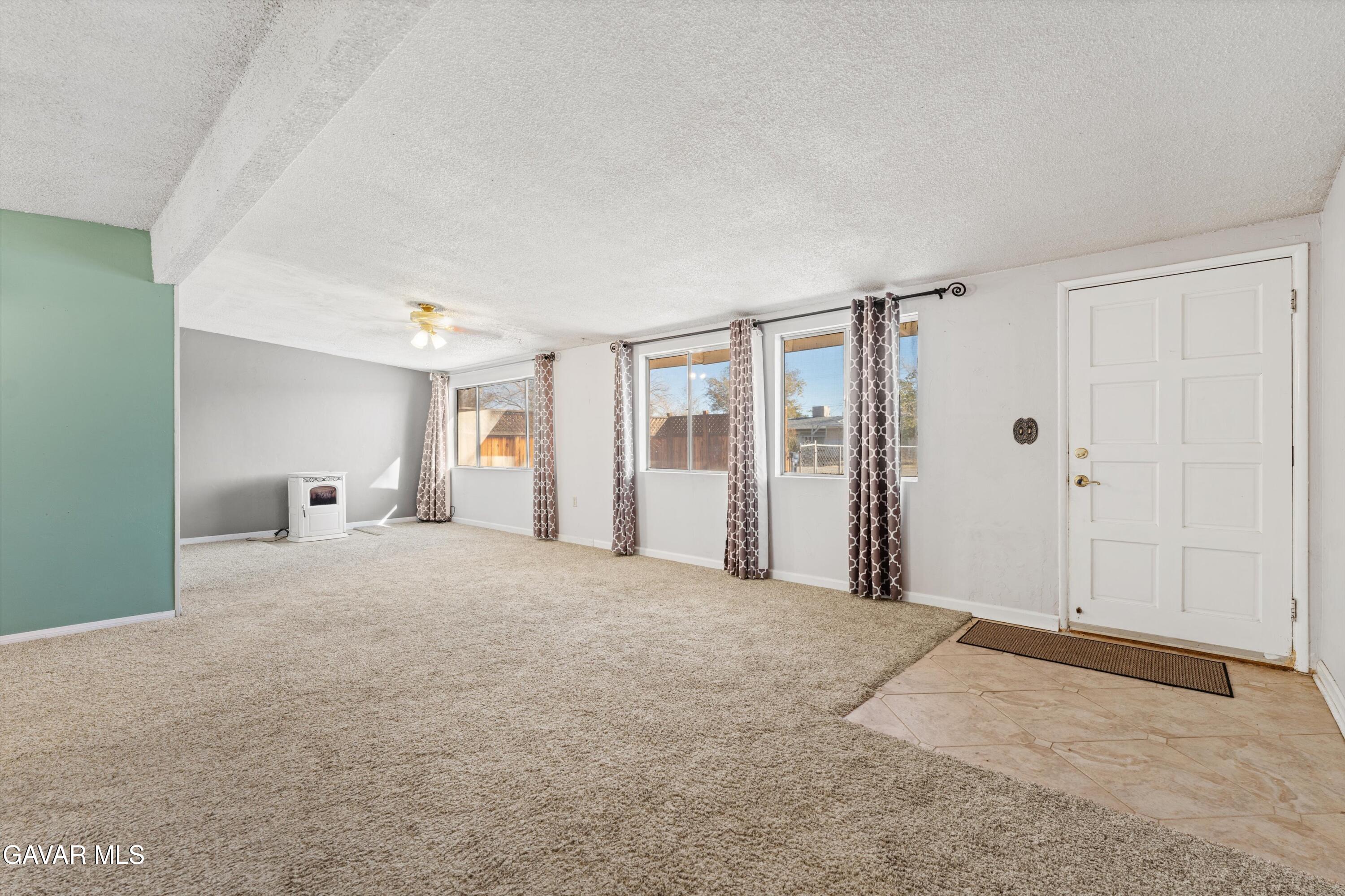 13445 Fran Street North Edwards, CA 93523 - Photo 4 of 27 a big room with closet and windows
