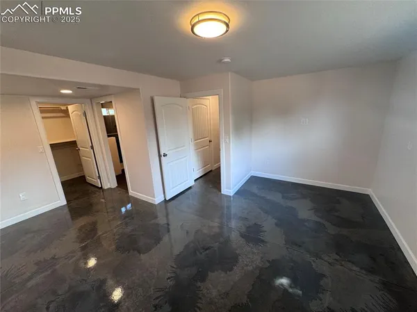 a bathroom with a sink a shower and a mirror